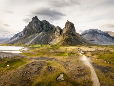 Eystrahorn mountain and gravel road in Hvalnes Nature Reserve Iceland