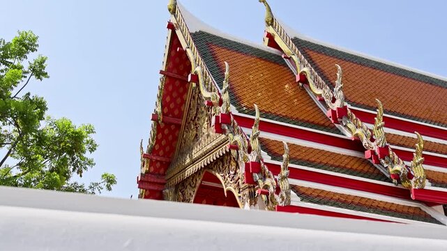 Luxurious temple architecture with intricate sculptures and naga figures Wat Phra Kaew