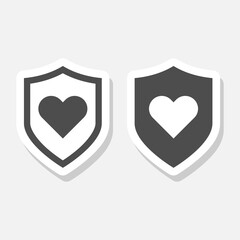 Naklejka premium Heart shield sticker isolated on gray background