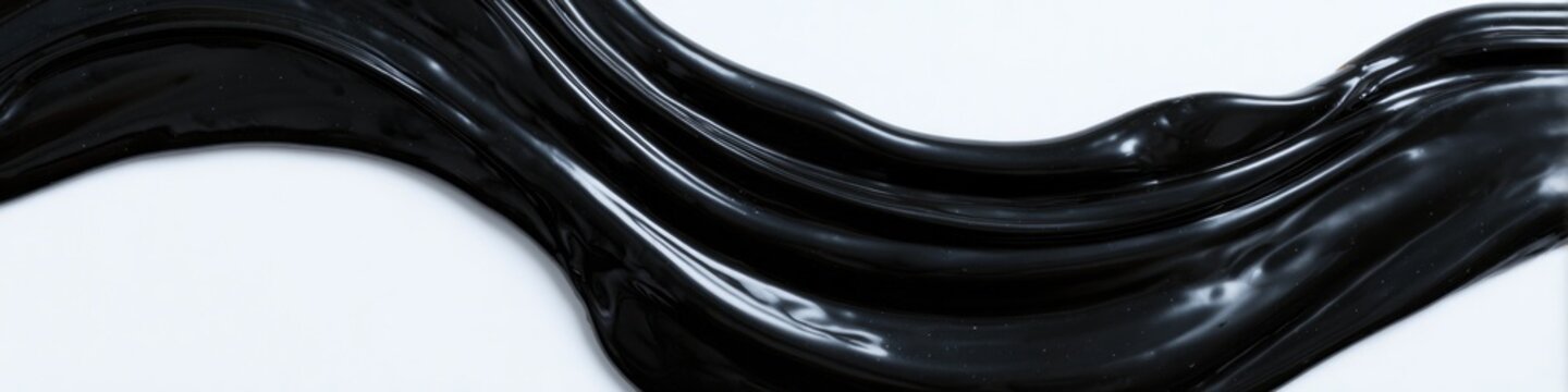 Smooth black liquid flows gracefully, showcasing texture and dep