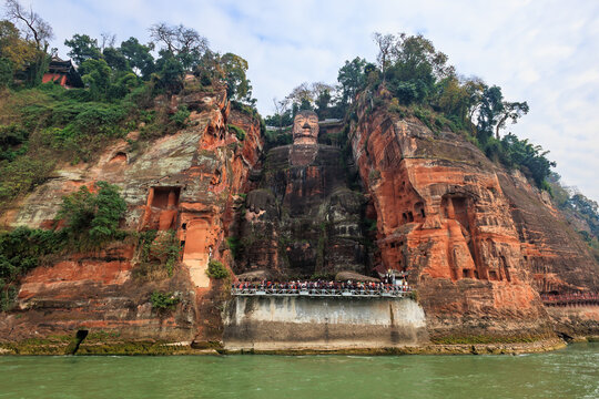 Leshan giant buddha carved into cliff overlooking river in china