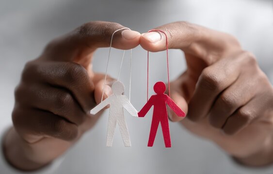 Puppet Master: The image conveys the idea of control. hands manipulating small paper puppets, evoking themes of control, manipulation, and power dynamics. 