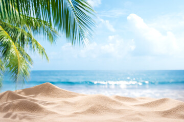 Obraz premium Sand beach sparkling in the sun with palm leaves shadow on blue bright summer sky and sea waves background