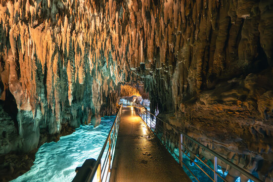 Majestic Stalactites and Stalagmites Speleothems Inside Limestone Cave.