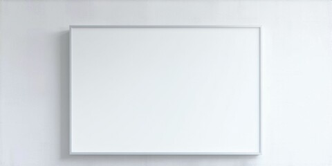 Obraz premium Blank framed canvas hangs centered on light wall. Minimalist design, clean aesthetic, simple presentation. Focus remains solely on empty space.