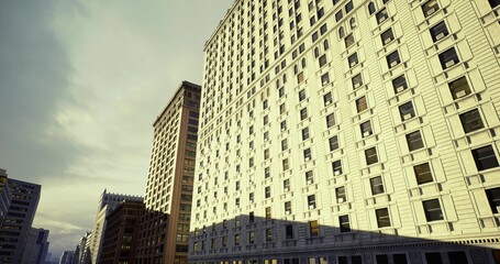 historic masonry juxtaposed with glass towers, ornate cornices near sleek curtain walls, textured brickwork meeting reflective modernity under pale sky © icetray