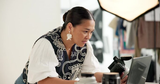 Photographer, woman and camera in studio with laptop, photoshoot review or smile for film production. Producer, person and tech on set with equipment, creativity or media transfer for photography bts