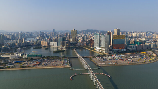 Aerial view of the glistening Sai Van Bridge stretching across the tranquil waters, connecting the modern skyline of Macao, Macao, Macao.