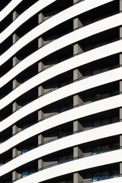 Abstract architecture facade with bold stripes creating pattern repetition and geometry with high contrast and diagonal rhythm as modern texture in spain