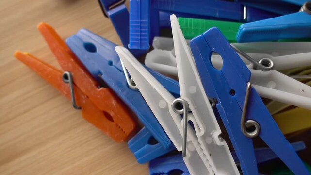 Multi coloured plastic clothes pegs