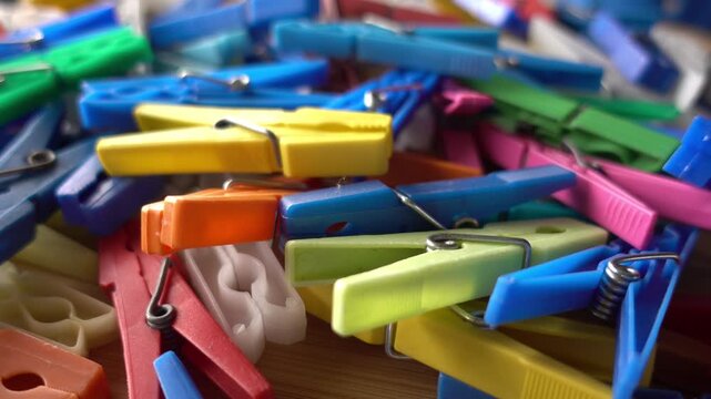Multi coloured plastic clothes pegs