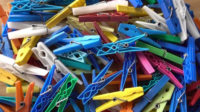 Multi coloured plastic clothes pegs