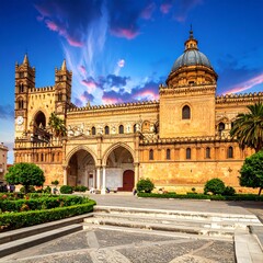 Obraz premium A stunning cathedral with intricate architecture, a large dome, and towers set against a vibrant, cloud-filled sky