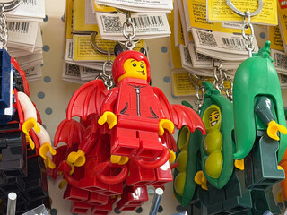 Fototapeta premium Lego minifigure keychains: devil and pea-pod costumes