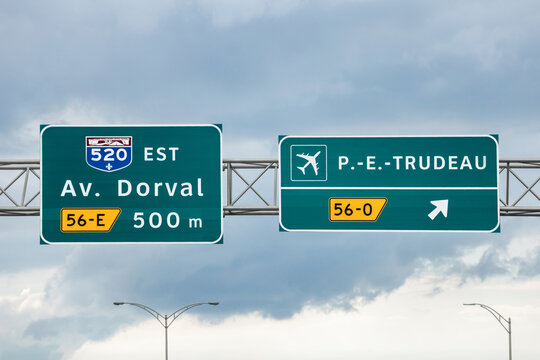 Montreal, Canada - August 24, 2025: Highway sign indicating exit to Pierre Elliott Trudeau International Airport near Montreal