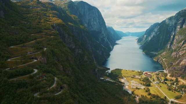 Aerial view of winding road along a fjord