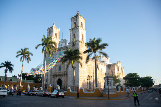 Catedral de San Gervasio in Valladolid, Yucatan, Mexico, with palm trees and colorful decorations