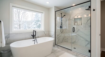 Luxurious modern bathroom with free-standing tub, glass shower, and outside view