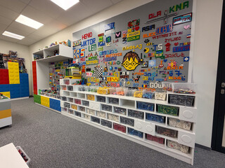 Fototapeta premium Organized lego studio wall with sorted bricks