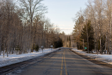 Obraz premium A rural two-lane highway in the Northwoods