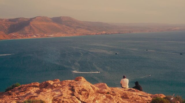 Panorama of Imsouane bay. Sunrise at the beach with surfers in morocco. beautiful lines with waves
