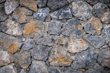 Obraz premium Old rustic stone wall in Cyprus village