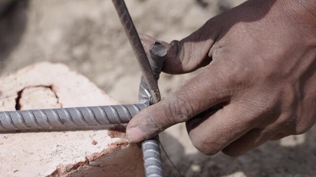 Iron rods being tied with wire