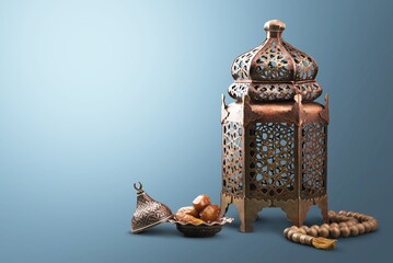 Welcome Ramadan lantern, dates fruit and rosary.