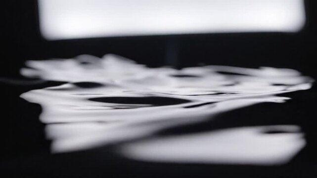 Liquid metal waves flowing through abstract futuristic landscape with molten fluid motion