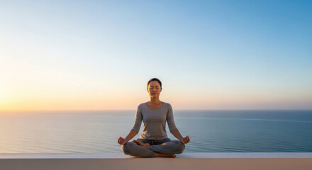 Fototapeta premium Meditative Person Atop Ocean Horizon