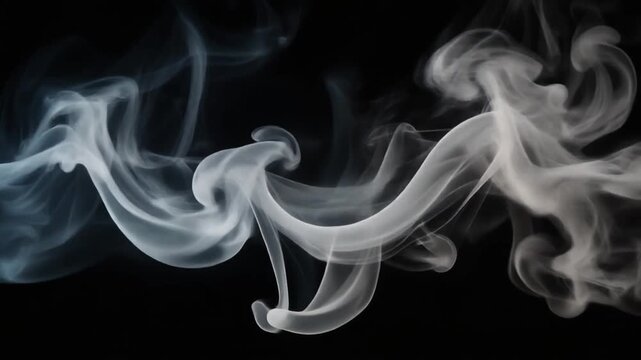 Wispy smoke tendrils dance against a dark background, captured in a close-up view
