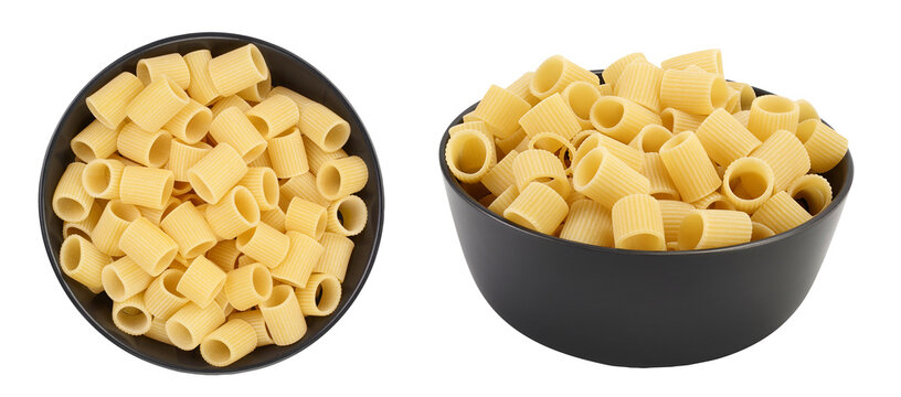 raw italian pasta in ceramic bowl isolated on white background. Mezze Maniche Rigate Bronze die. Top view. Flat lay.