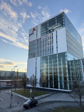 Munich, Germany &ndash; Jan. 09, 2026: facade of the modern glass-steel building of the "PricewaterhouseCoopers GmbH" auditing company ("PwC") at the &ldquo;Hackerbr&uuml;cke&rdquo; with logo at the beginning  of 2026