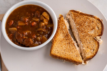 beef stew with a chicken melt sandwich