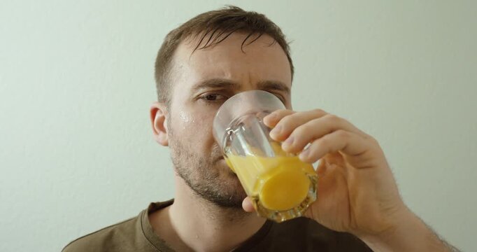 Man with diabetes experiencing symptoms of low blood sugar such as sweating, trembling, weakness, and dizziness, highlighting hypoglycemia awareness and urgent self care management.