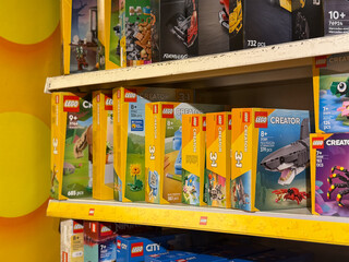 Naklejka premium Lego creator sets on store shelf