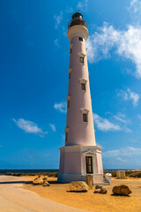 A view of the California Lighthouse on the northwestern Atlantic coast of Aruba on a bright sunny day
