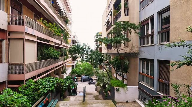 Athens, Greece residential neighborhood with apartment home house buildings at Lykavitos Hill or Mount Lycabettus in summer