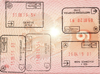 Fototapeta premium Passport control in the airport. Visiting Swiss city of Geneva. Amazing Switzerland. Genève. Austria. The Netherlands. Stamps on the passport page left by an official