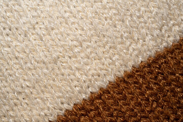 A close up of a white and brown knitted blanket © jr-art