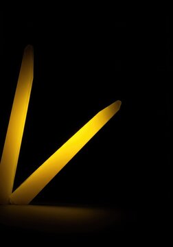 A vivid bright yellow object contrasted dramatically against a deep, dark black background creating a powerful visual impact ,concept ,contrast ,simple