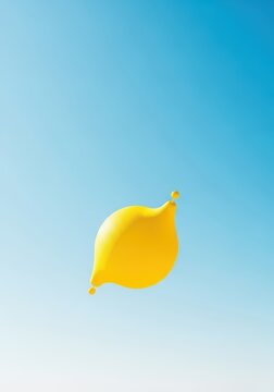 Vibrant yellow object bouncing high against a clear bright sky, capturing the joyous energy of a warm summer day, energetic, happy, sunlight