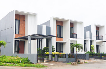 A row of just finished new townhouses.