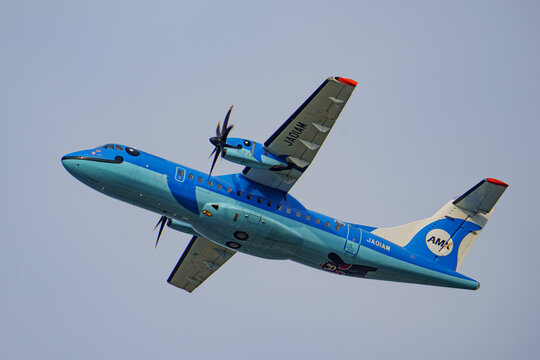 Amakusa, Kumamoto Japan - 2025 September 19: An Amakusa Airlines ATR 42-600 aircraft (JA01AM) featuring a blue dolphin design takes off and climbs from Amakusa Airport. Kumamon is on the belly.