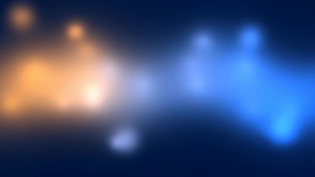 Abstract blurred bokeh lights in orange and blue against a dark background, background for celebration or technology