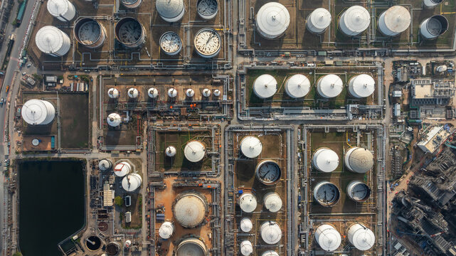 Aerial view industrial storage tank farm for oil and gas or chemical, Global fuel supply oil and gas, Industrial oil and gas storage tank farm facility energy reserves infrastructure fuel supply chain