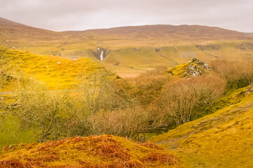Fototapeta premium The fairytale lands in the hilltop Castle Ewan, Fairy Glen, Isle of Skye, Scotland