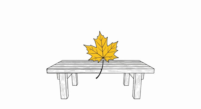 A single yellow maple leaf rests on a wooden picnic table