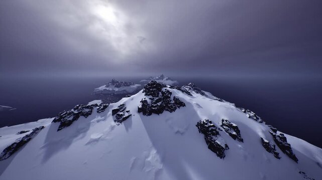 dramatic snowy ridge under brooding sky with deep shadows, powerful light and scale create sublime atmosphere ideal for inspirational and editorial storytelling