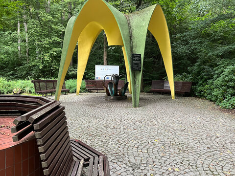 Kudowa-Zdroj, Poland, September 5, 2025: The Stanislaw Moniuszko Spring under a shelter called "Spider" in the Spa Park in Kudowa-Zdroj, Poland